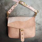 Luxury Leather Handbag with Brass Hardware